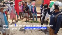 Protesters in Myanmar’s south burn copies of the 2008 constitution, Chinese and Russian flags