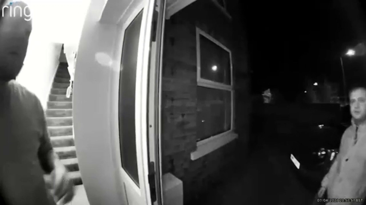 Dramatic doorbell footage shows "terrifying" moment three men banged on strangers' door late at night - and then barged in with metal bars in attempt to steal victim's dogs