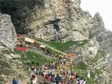 Pilgrims enter the cave of Amarnath