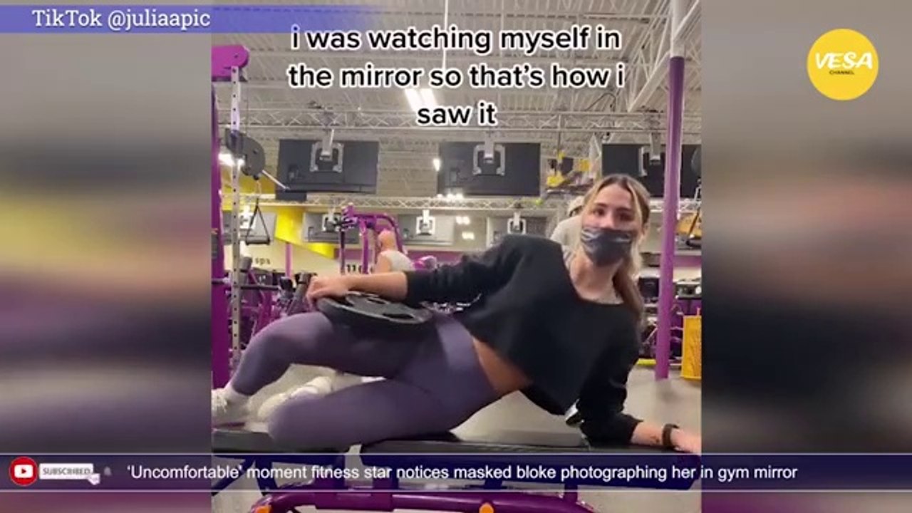 Uncomfortable moment fitness star notices masked bloke photographing her in gym mirror