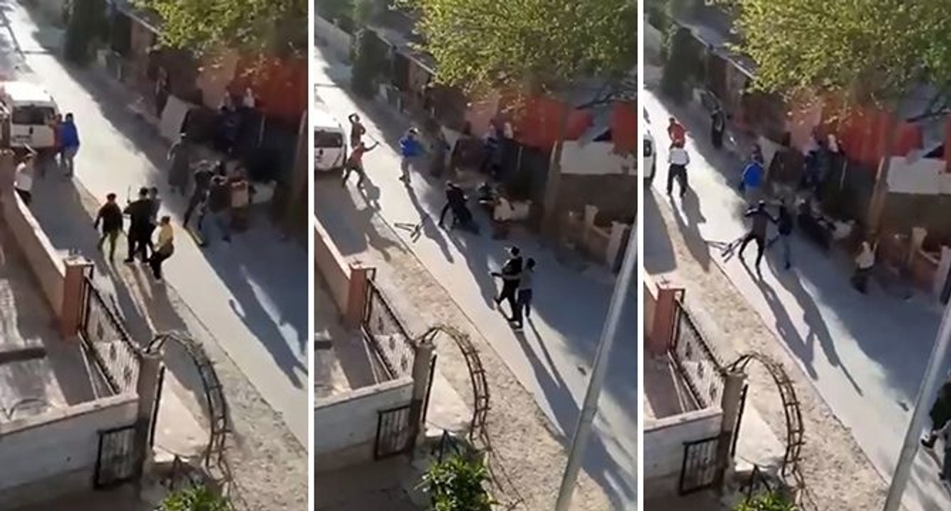 Komşuların taşlı sopalı kavgası kamerada