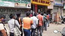 Delhi imposes 6-day lockdown, hundreds queue up outside liquor shops