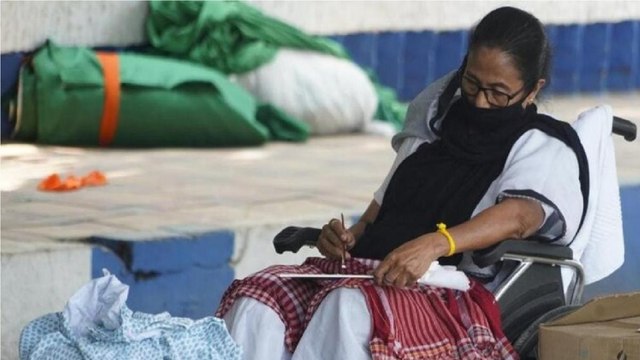 Banerjee sitting on dharna paints pictures