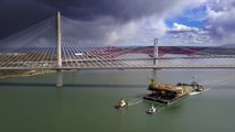 Iron Lady barge with its cargo of a topside drilling platform heading up the Forth into The Port of Rosyth