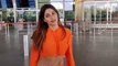 Big Boss Fame - Nikki Tamboli Hot In Orange Dress Spotted in Airport