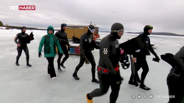 Küresel ısınmaya dikkat çekmek için buz altında sergi düzenledi