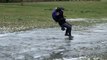 Man Slips And Falls On His Back While Walking On Icy Ground