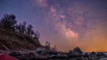 Night sky pops with color in time-lapse video over Canada