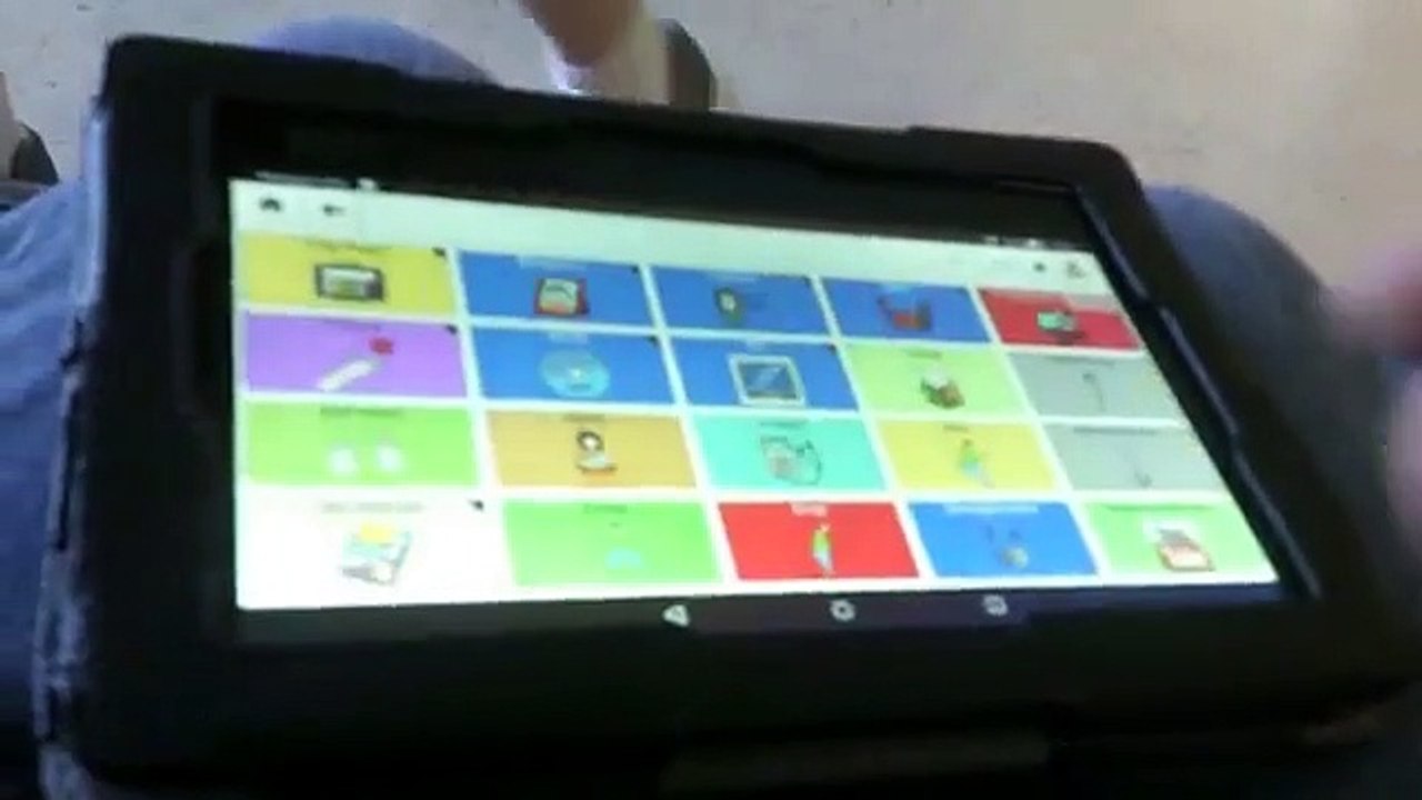 Adult with Autism  having  a  conversation using coughdrop AAC