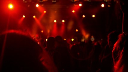 mixkit-young-women-jumping-at-the-concert-14116-medium