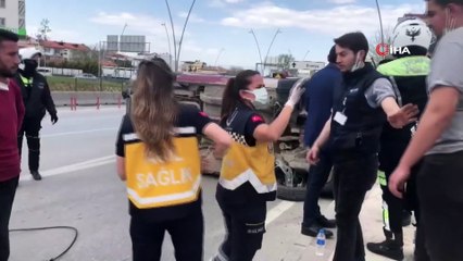 Yan yatan aracın sürücüsünü vatandaşlar kurtardı