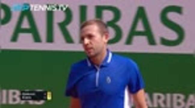 Evans stuns Djokovic to reach last eight