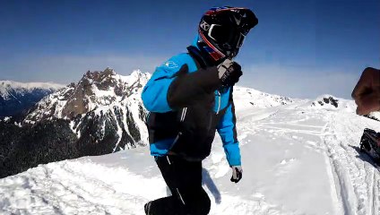 Perfect Springtime Snowmobile Cliff Drop