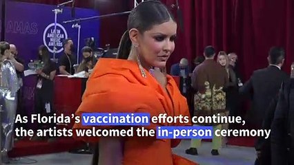 Stars hit Latin American Music Awards white carpet in Florida