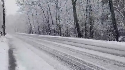 Storm dumps springtime snow across much of New England