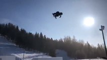 Girl Performs Multiple Flips While Snowboarding Off Snow Ramps