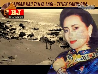 JANGAN KAU TANYA LAGI - TITIEK SANDHORA
