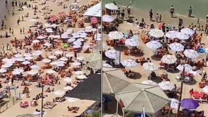 Maske zorunluluğunu kaldıran İsrail'de plajlar tıklım tıklım