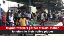 Migrant workers leave for their native places after Delhi imposed a Covid-19 lockdown