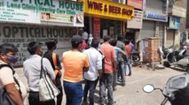 Long queues outside liquor shops in Delhi before lockdown