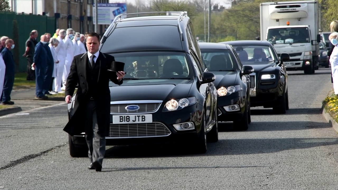 Fisherman's Friends staff line the street to pay respects to Doreen Lofthouse