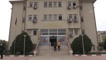 Adana'da türbede saygısızlık yaptığı gerekçesiyle gözaltına alınan şüpheli hakkında adli kontrol kararı