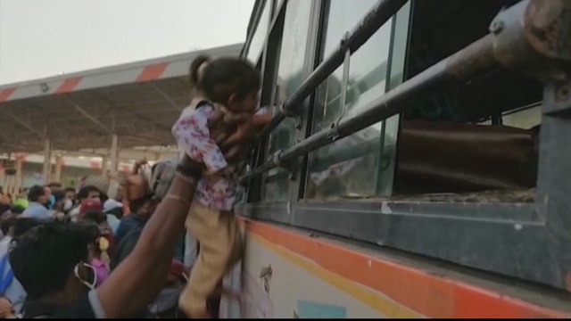 India migrant workers flee capital as COVID batters economy