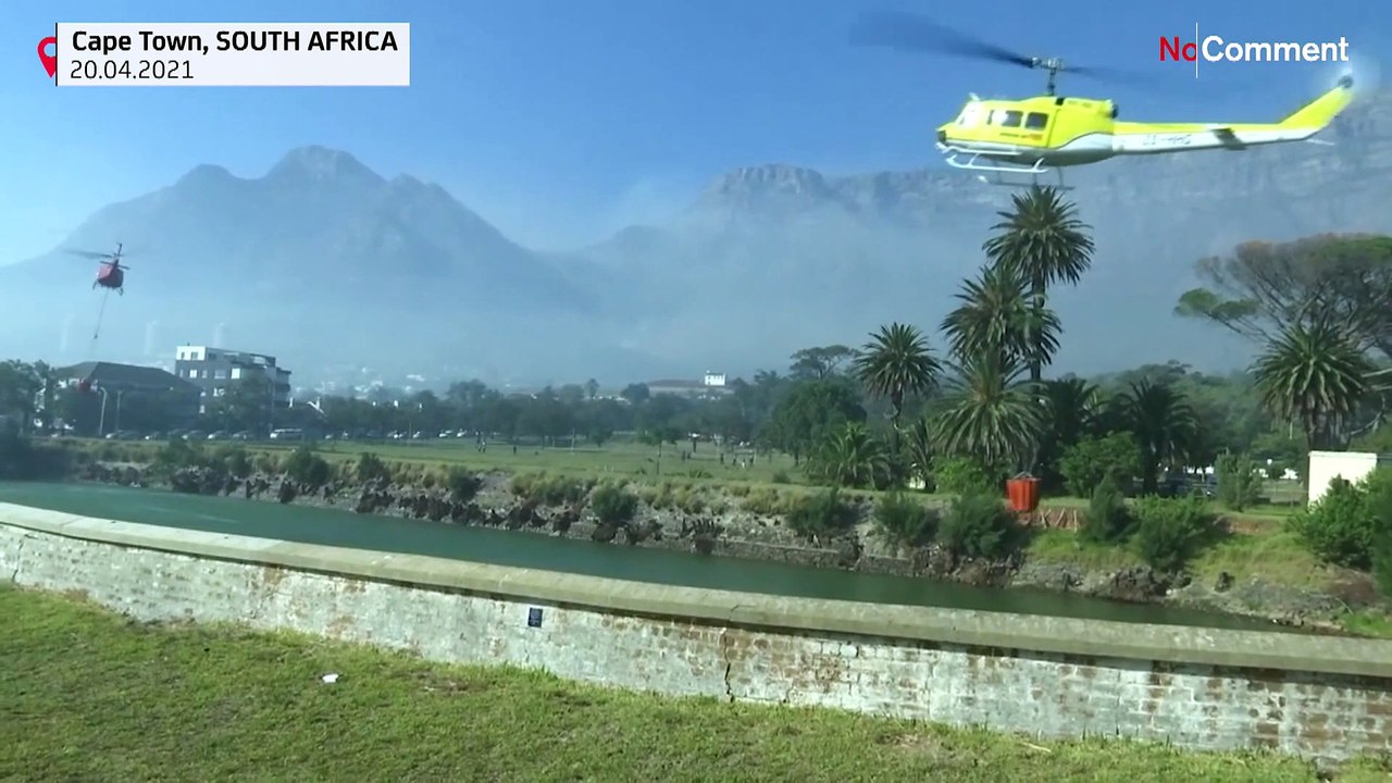 Crews work to extinguish wildfire on Table Mountain