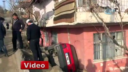 Otomobil evin bahçesine düştü