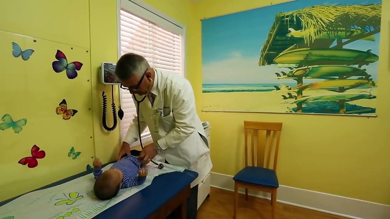 How To Calm A Crying Baby - Dr. Robert Hamilton Demonstrates "The Hold" (Official)