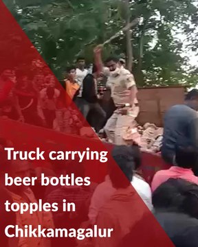 Hundreds gather as truck carrying alcohol topples, police resort to lathicharge