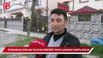 Rüzgardan kırılan telefon direğini böyle sabitlediler