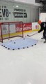Man Hits Multiple Hockey Pucks Into Goal At High Speed