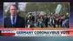 Protests in Berlin as parliament approves new COVID restrictions