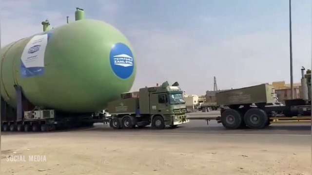 4.3 million liters capacity tank transportation by Mercedes Benz puller trucks with 512 tyres flat bed trailer | Heavy Equipment Transportation | zamil steel company