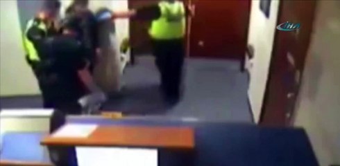 Karakolda polise bayıltan yumruk!