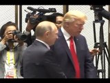 لقاء موجز بين بوتين وترامب   - عنان زلزلة