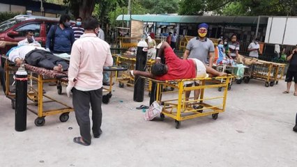 Download Video: Covid patients on stretchers lie outside Delhi's Hospital