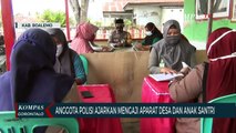 Anggota Polisi Ajarkan Mengaji Aparat Desa Dan Anak Santri