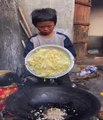 Little boy cooking food like a professional chef , cuisine