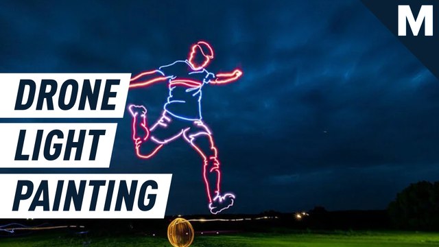 Drones create impressively gigantic light painting of a football player