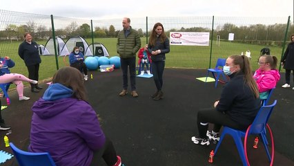 William and Kate have a go at golf during charity visit