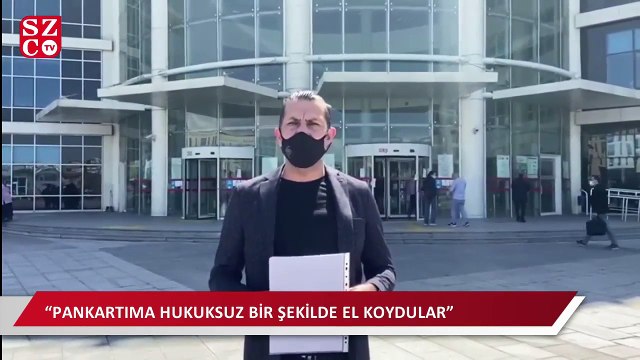 Evinin balkonundan indirilen ‘128 milyar dolar nerede?’ afişini yargıya taşıdı