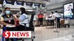 Thailand turns main airport check-in counters into vaccination centre