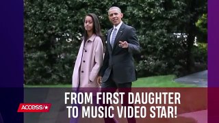Malia Obama Rocks Out In Her Music Video Debut Playing A Harmonica _ Access