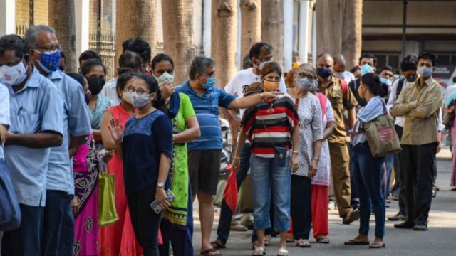 Mumbai: People stand in queue outside vaccination centre