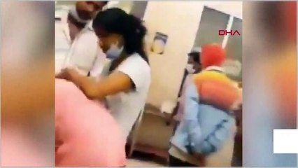 Hindistan'da Kovid-19'a karşı verilen yaşam mücadelesi kamerada: Annesine suni teneffüs ile müdahale etti