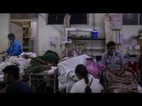 As COVID-19 floods India’s hospitals, the better-off also scramble for care