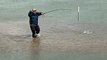 Fisherman Catches Fish By Hand After Fishing Line Breaks