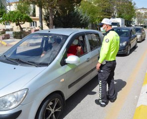 EKMEK ALMAYA ÇIKTIKLARINI SÖYLEYEN OTOMOBİL SÜRÜCÜSÜ VE OĞLUNA CEZA